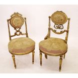 Two French 19th century gilt framed salon chairs with petit point upholstery, 82cm high, in need