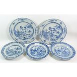 A pair of 18th century Chinese blue and white plates painted landscapes, 29cm and three similar