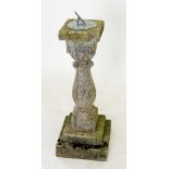 A brass sundial on stoneware stand, 76cm tall