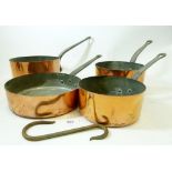 Four copper saucepans, largest 22cm