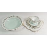 A Tuscan vintage 'Tresco' tea and dessert service comprising: ten cups and saucers, twelve tea