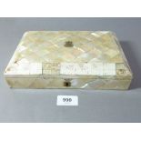 A mother of pearl clad games box with contents of counters and fitted mother of pearl cribbage board