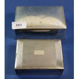 Two silver clad cigarette boxes 11.5 x 8.5cm Sheffield 1966 by Viners and another 14 x 9cm