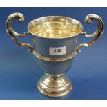 A silver two handled trophy cup, Sheffield 1926, not engraved, 22cm tall, by James Dixon & sons,