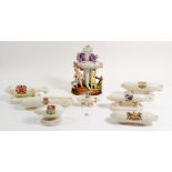 Seven crested china zeplins and a cherub and zeplin figure group