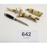A Japanese Meiji period ivory miniature kris dagger brooch with yellow metal mounts and a
