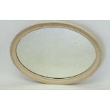 A Victorian large oval carved mirror, 37cm wide