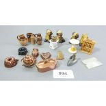 A group of dolls house copper and miniature items, Wade whimsies, mother of pearl