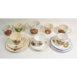 A collection of Royal Commemorative tea cups and saucers and mugs including Doulton and Masons