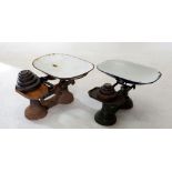 Two sets of cast iron kitchen scales and assorted weights