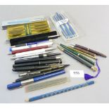 A box of various ball point pens and propelling pencils