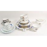 A Sampson Smith part tea service comprising: three cups and four saucers, six tea plates, cake plate