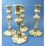 A set of four 19th century silver plated foliate cast candlesticks, 13cm tall