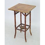 A vintage bamboo occasional table