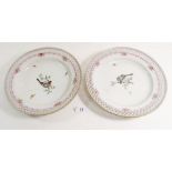 A pair of Berlin plates with pierced borders painted birds, one a/f, 24cm diameter