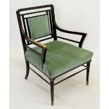 An ebonised Aesthetic style open armchair