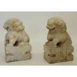 A pair of large Chinese carved marble kylin lions, 37cm tall 37 x 24cm