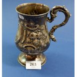 A Victorian silver cup with embossed decoration and presentation inscribed 'Cleobury Mortimer