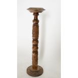 A vintage carved wood ashtray stand