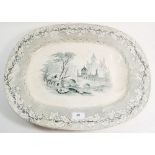 A Victorian large meat plate with gravy well decorated landscape