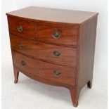 A late Georgian mahogany bow fronted chest of two short and three long drawers on splay feet, 90cm