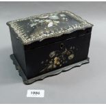 A Victorian papier mache tea caddy with mother of pearl decoration, 18.5 x 12.5cm
