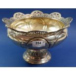 A silver pedestal fruit bowl with pierced border, 999g, Sheffield 1913, 26cm diameter, Maker James