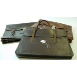 Two vintage leather document cases and a music bag