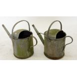 Two galvanised watering cans