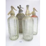 Four various antique and vintage soda siphons