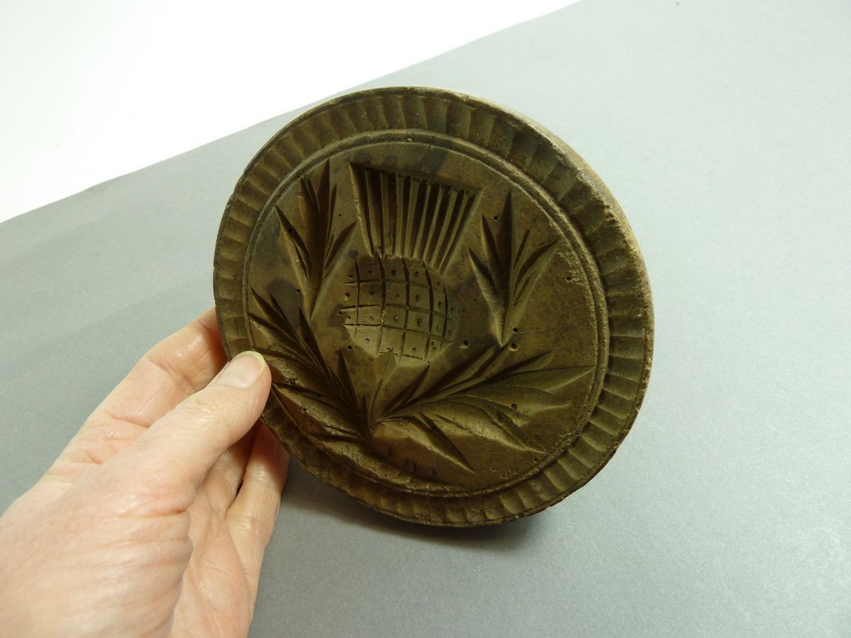 A Victorian asparagus form chocolate mould, various treen butter moulds, pie mould etc. including - Image 11 of 13