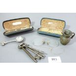 Three pairs of gold plated or yellow metal spectacles and various keys etc.