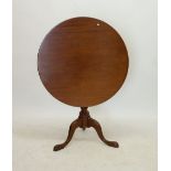 A 19th century mahogany tilt top circular occassional table on turned column and triple cabriole