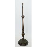 A 19th century brass standard lamp with reeded decoration