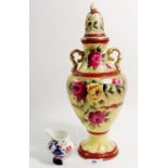 A Victorian pottery vase and cover painted roses, 34cm and a small Gaudy Welsh cream jug