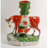 A Victorian Staffordshire spill vase group of cow and calf, 28cm