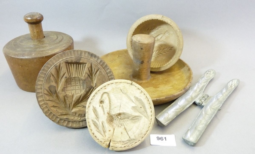 A Victorian asparagus form chocolate mould, various treen butter moulds, pie mould etc. including