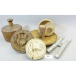 A Victorian asparagus form chocolate mould, various treen butter moulds, pie mould etc. including