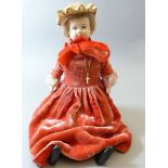 A Victorian doll with leather body and papier mache face, 36cm tall