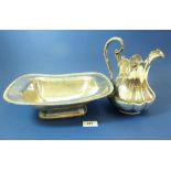 A Victorian silver plated jug and a silver plated serving dish