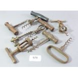 A collection of eight various antique corkscrews