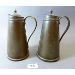 A pair of small copper hot water jugs, 21cm tall
