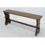 A small oak ecclesiastical style bench, 99cm long
