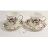 A Wedgwood 'Hathaway Rose' coffee set comprising: eight cups and saucers