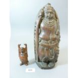 An oriental carved wood deity, 17cm and a miniature carved buddha