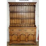 A fine quality oak 'Bryn Hall Country Furniture' Georgian style dresser with two drawers over