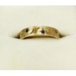 A 9 carat gold eternity ring set sapphires, 1.8g, size M to N