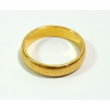 A 22 carat gold wedding ring, size S to T, 8.2g