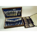 A Butler six place setting cutlery set and a Victorian fish cutlery set with faux ivory handles