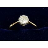 An 18 carat gold solitaire diamond ring, size M/N